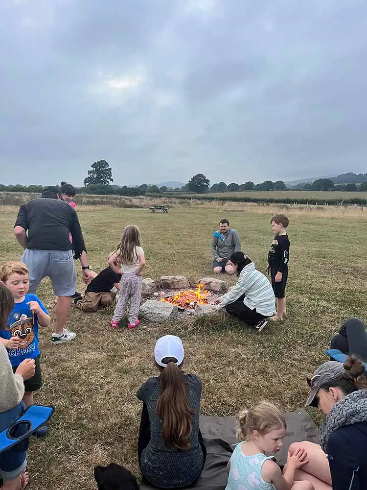 Building a campfire at Old Bidlake Farm